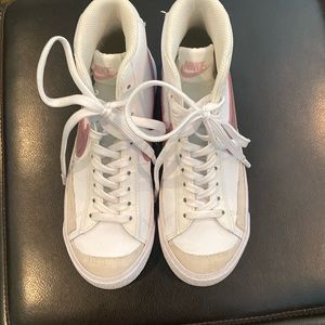 Girls Nike Blazer shoes.  Barely worn. No creases in shoe.  Clean soles